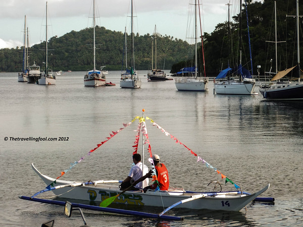 small boat boats in harbor